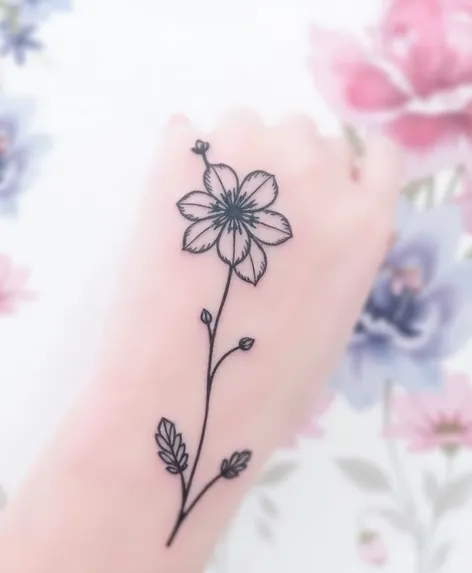 small flower tattoo