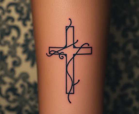 cross tattoo with vines