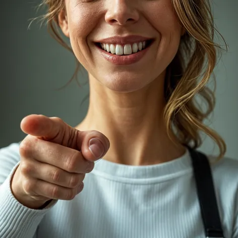 german smiling woman pointing