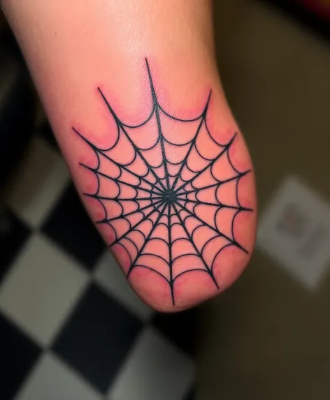 tattoo spider web elbow