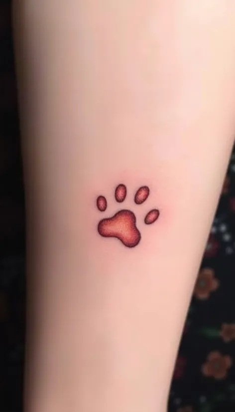 paw print cat tattoo