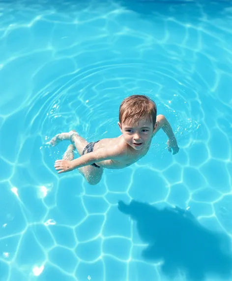 Naked Kid swimming