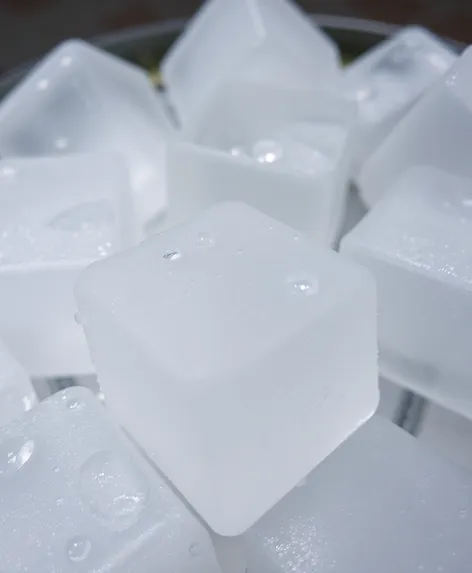 ice cubes drop into