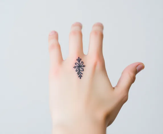 trival hand tattoo